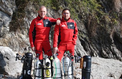 subacquei che si preparao ad un immersione nel lago di Como